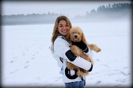 Anastasia with Labradoodle Puppy